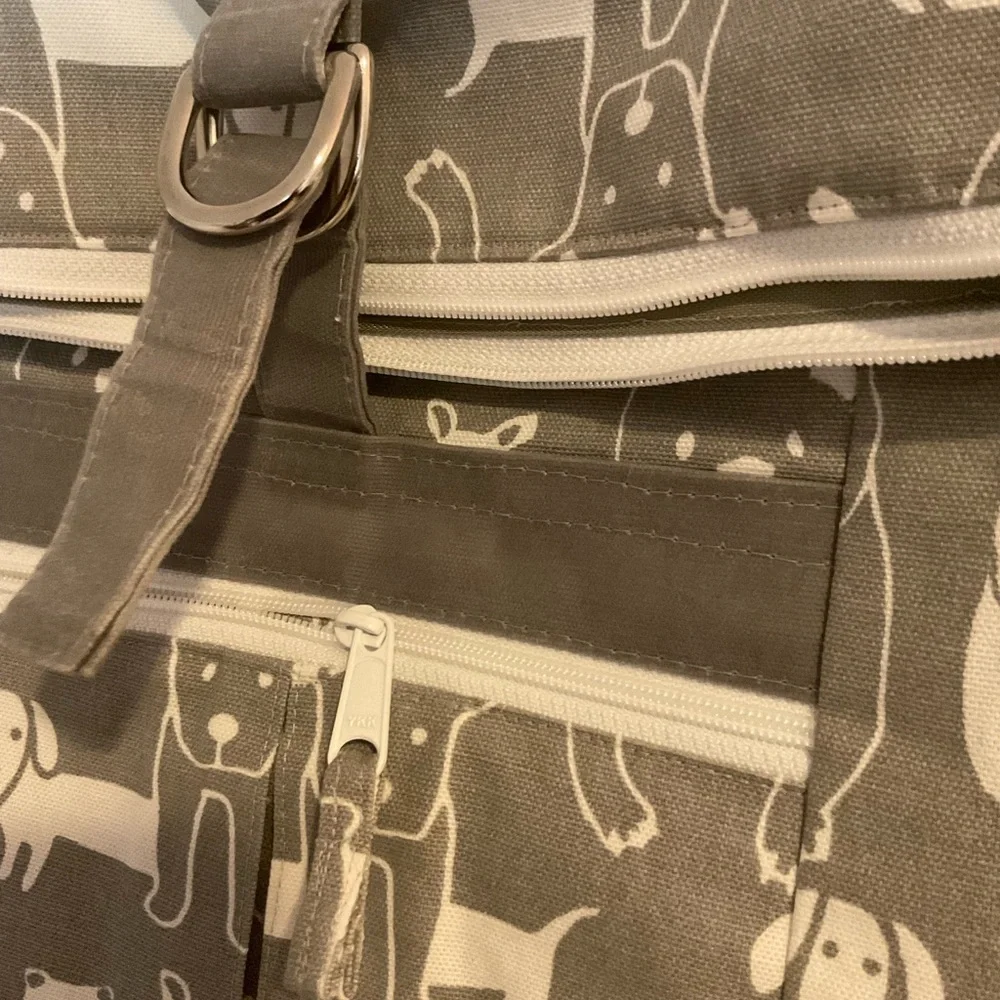 Gray and White Backpack with Dogs